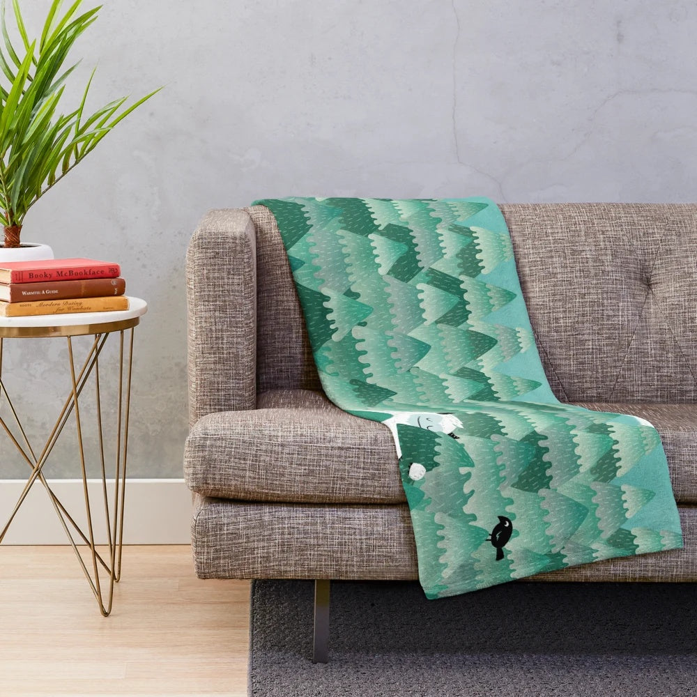 Soft and cuddly plush blanket featuring a cute forest creature design