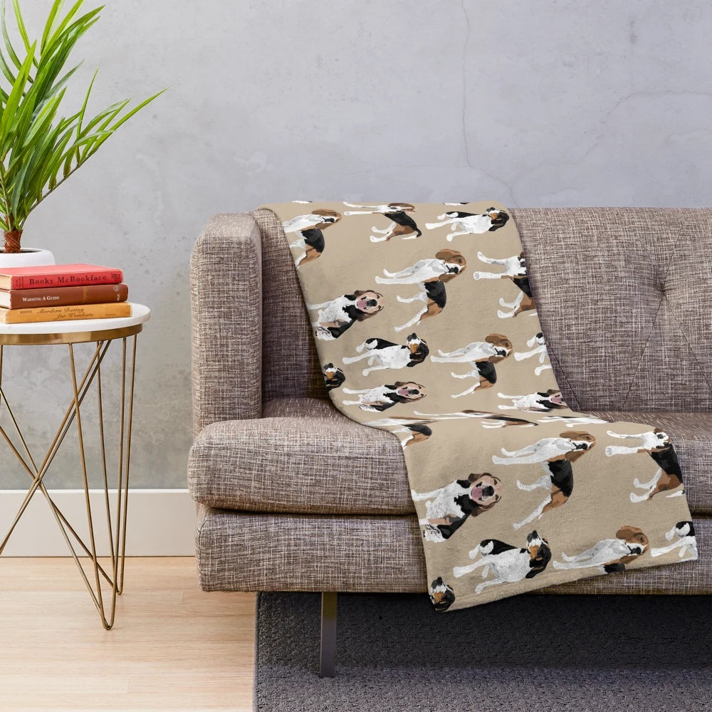 Treeing Walker Coonhound on a tan plush blanket
