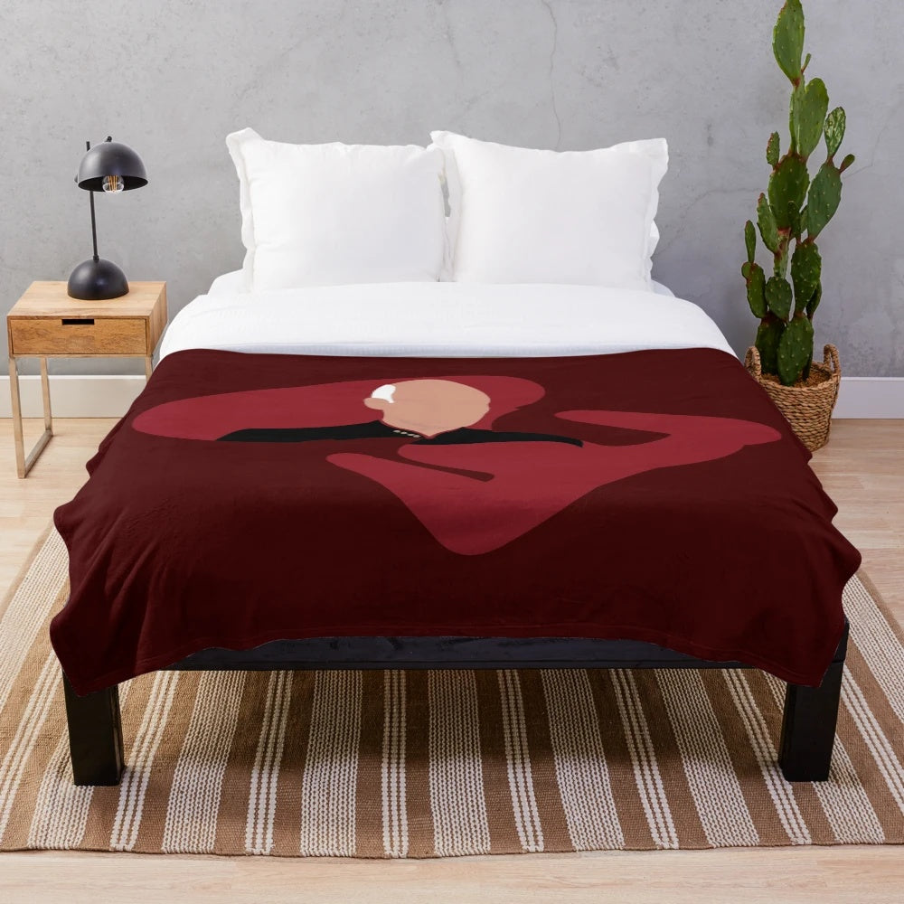 A plush, cozy blanket featuring the iconic Captain Picard from Star Trek: The Next Generation