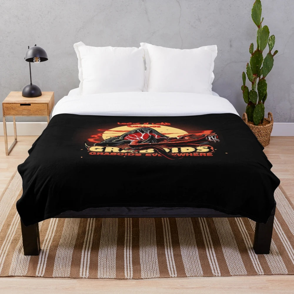 Plush blanket featuring Graboids, the underground monsters from the 1980s horror classic Tremors