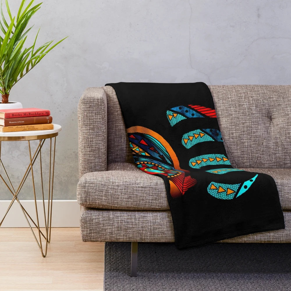 Plush blanket with bear claw inspired native american pattern