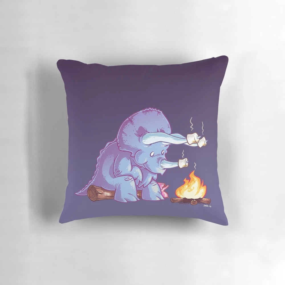 Soft, plush triceratops dinosaur pillow with marshmallow design, perfect for camping and outdoor adventures.
