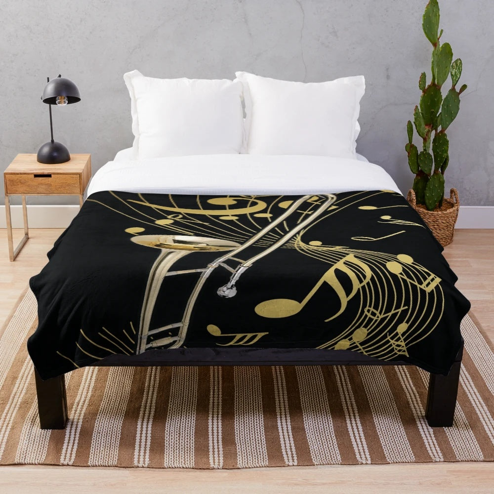 Trombone and music note patterned plush blanket