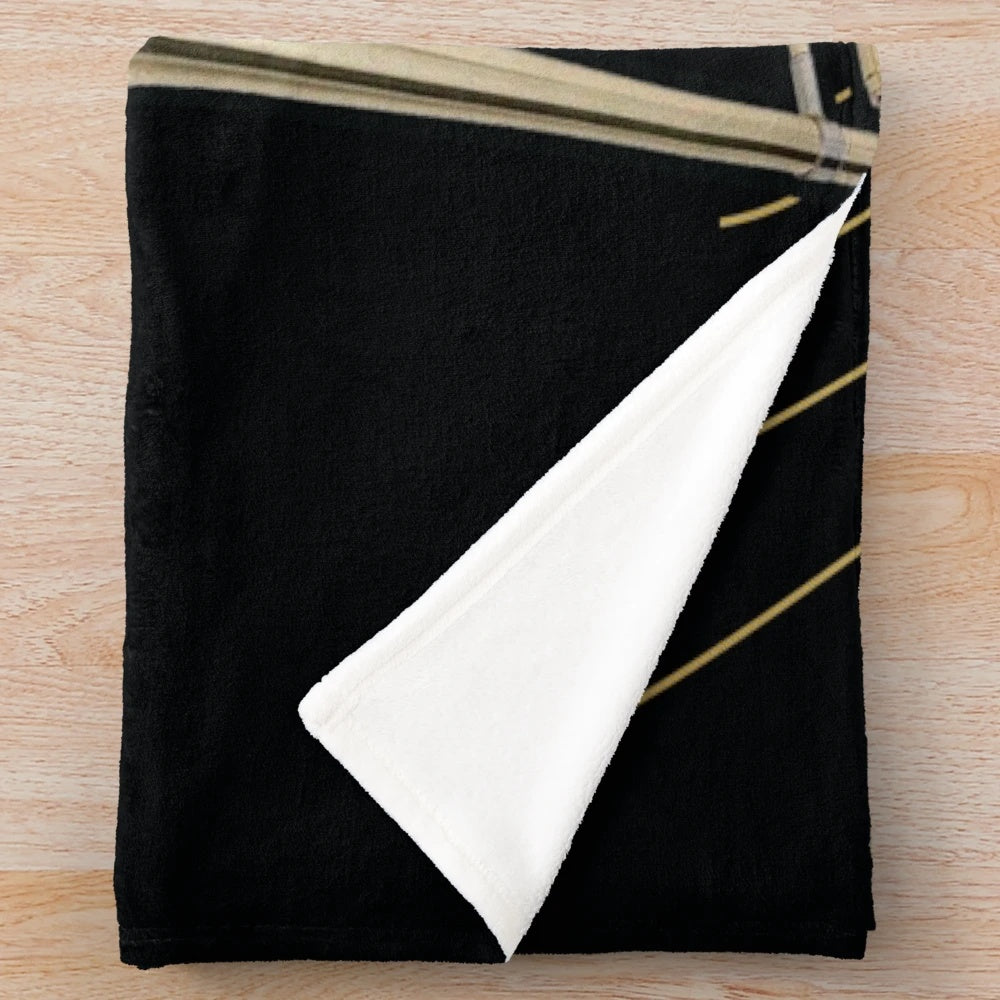 Trombone and music note patterned plush blanket