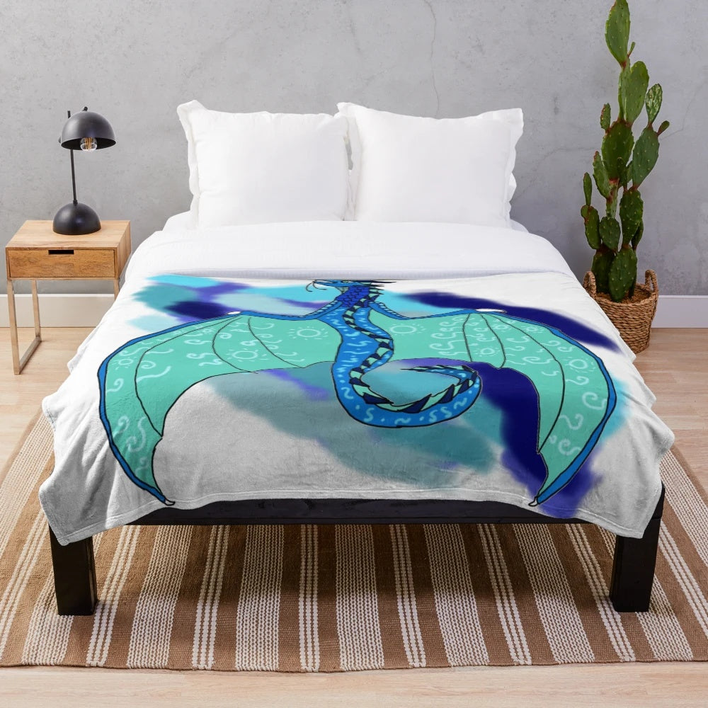 Tsunami-inspired plush blanket featuring dragon designs