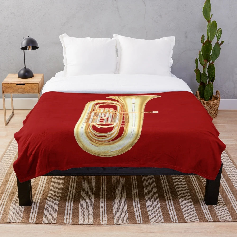 Cozy plush blanket featuring a tuba design, great for music enthusiasts