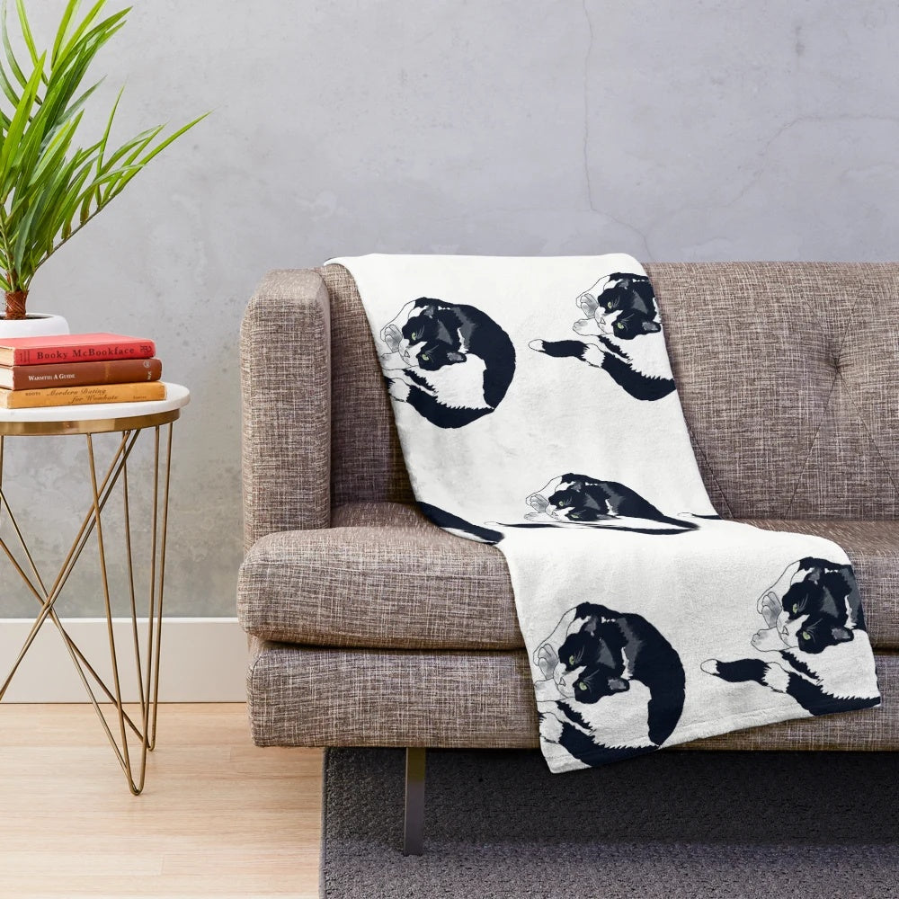 Soft, warm tuxedo cat plush blanket with black and white cat portrait