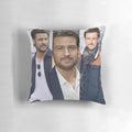 A collage of images featuring the handsome actor Tyler Hynes, showcased on a comfortable pillow.