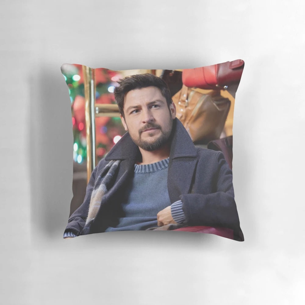 A soft, plush pillow featuring a close-up portrait of the handsome actor Tyler Hynes.