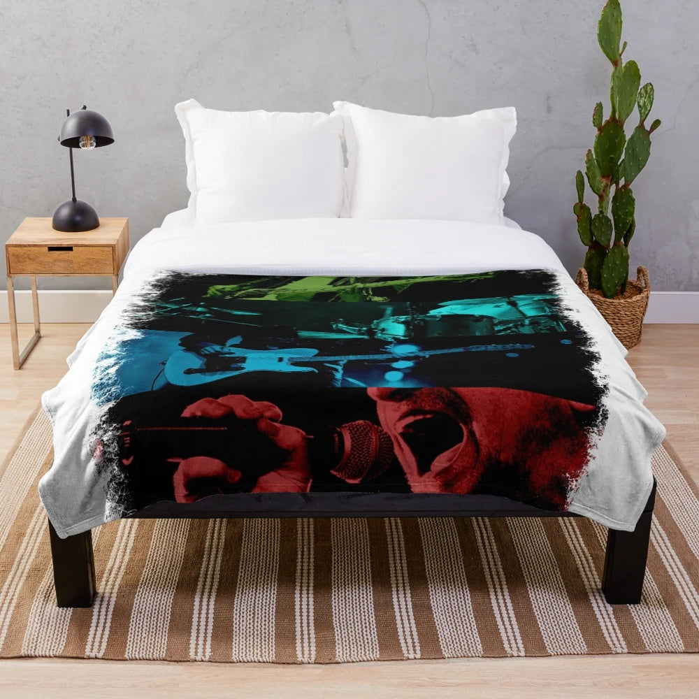 U2 plush blanket featuring the iconic band's logo and imagery
