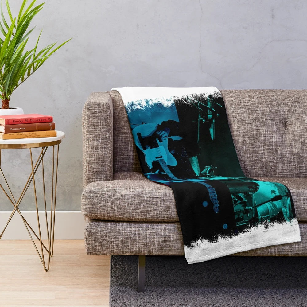 U2 plush blanket featuring the iconic band's logo and imagery
