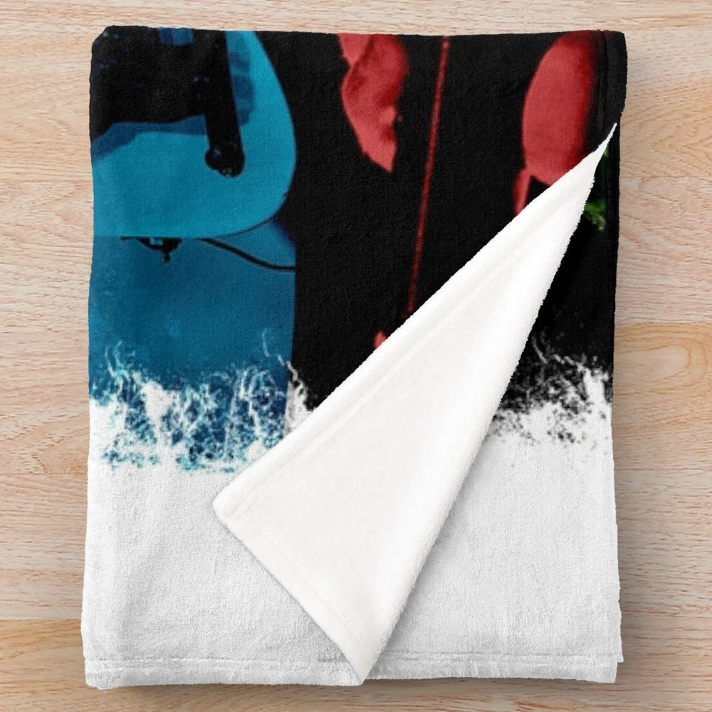 U2 plush blanket featuring the iconic band's logo and imagery