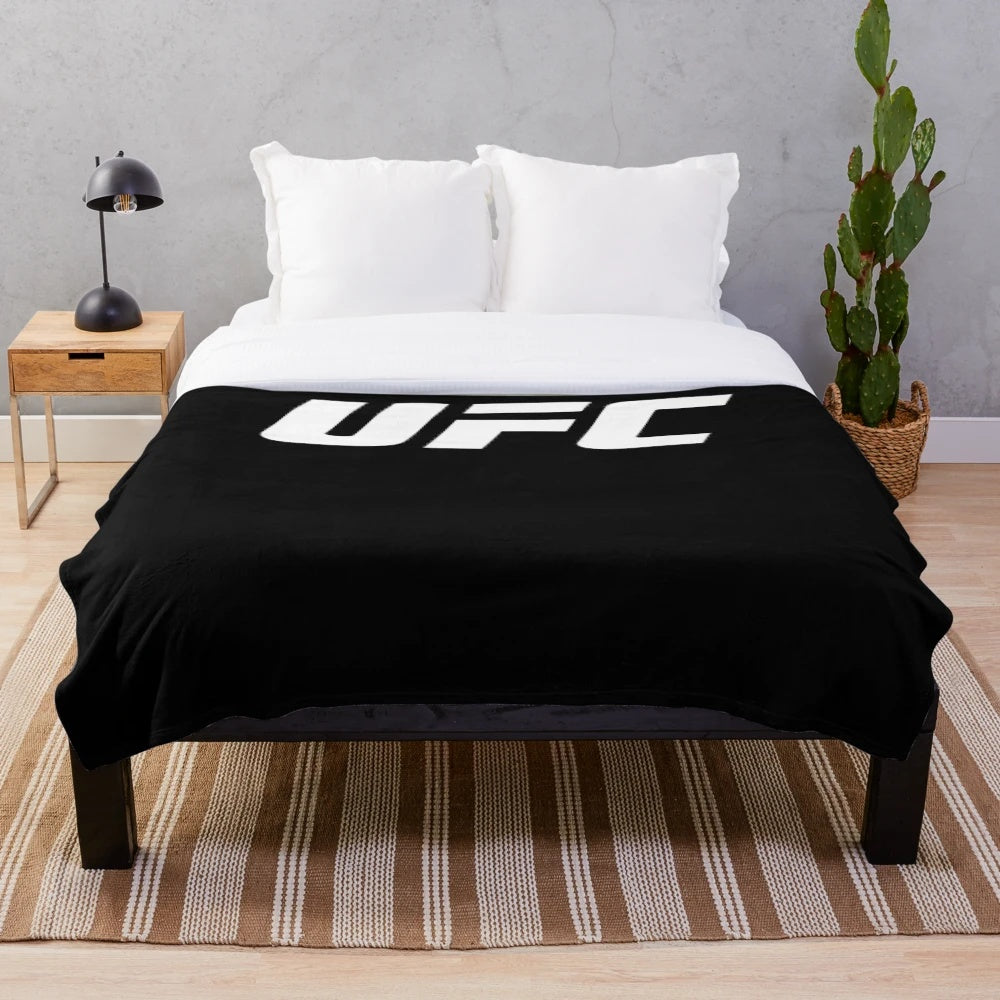 UFC-inspired plush blanket with fight imagery