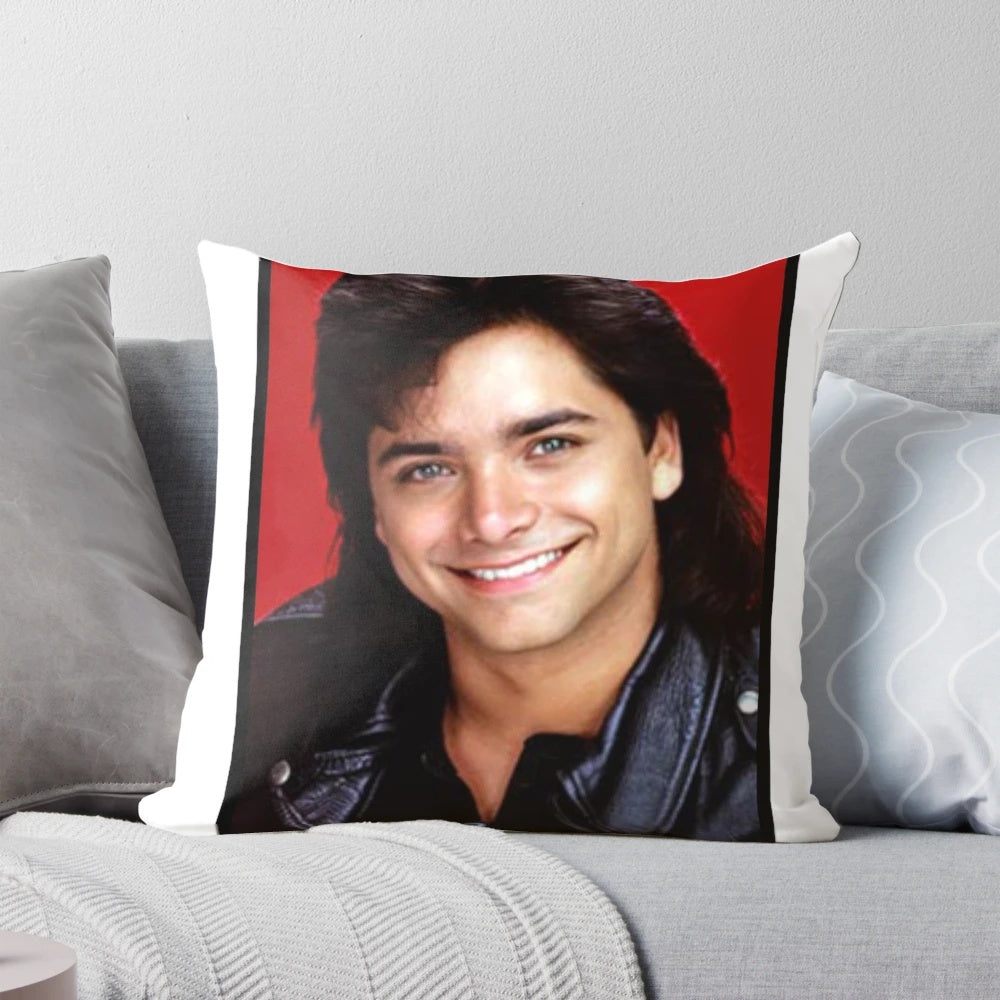 Soft, plush pillow featuring the likeness of the iconic "Full House" character, Uncle Jesse, played by actor John Stamos.
