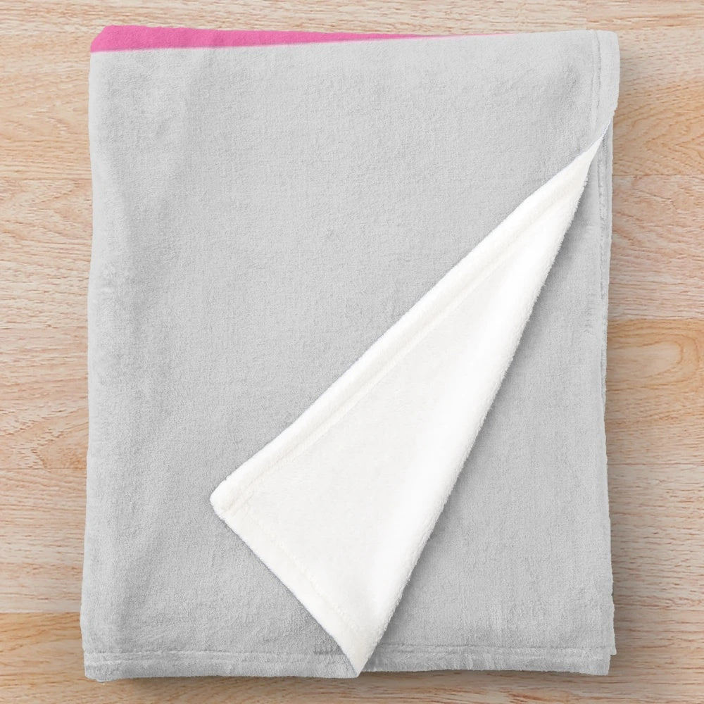 Cute and funny unicorn plush blanket with a smiling, pastel pink design