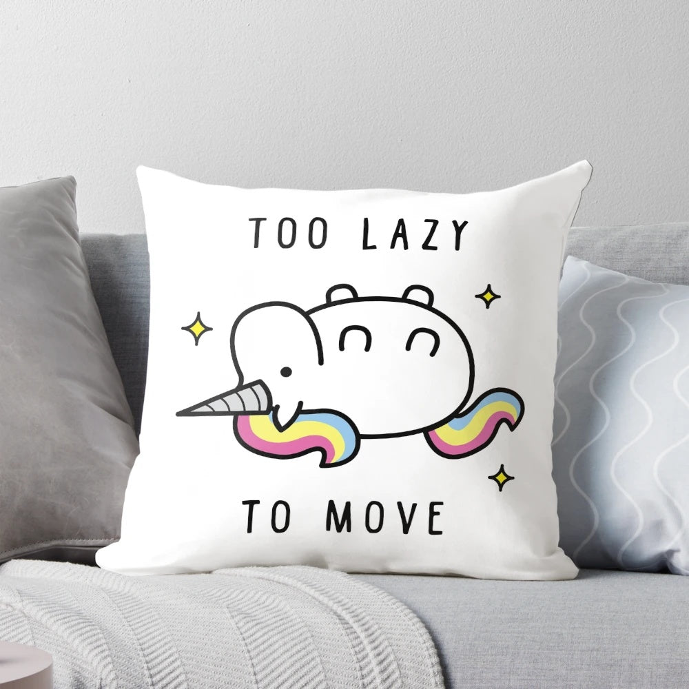 A plush, colorful unicorn t-shirt pillow with a "Too Lazy to Move" design.