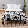 A cozy plush blanket with a gaming-inspired design, perfect for gamers.