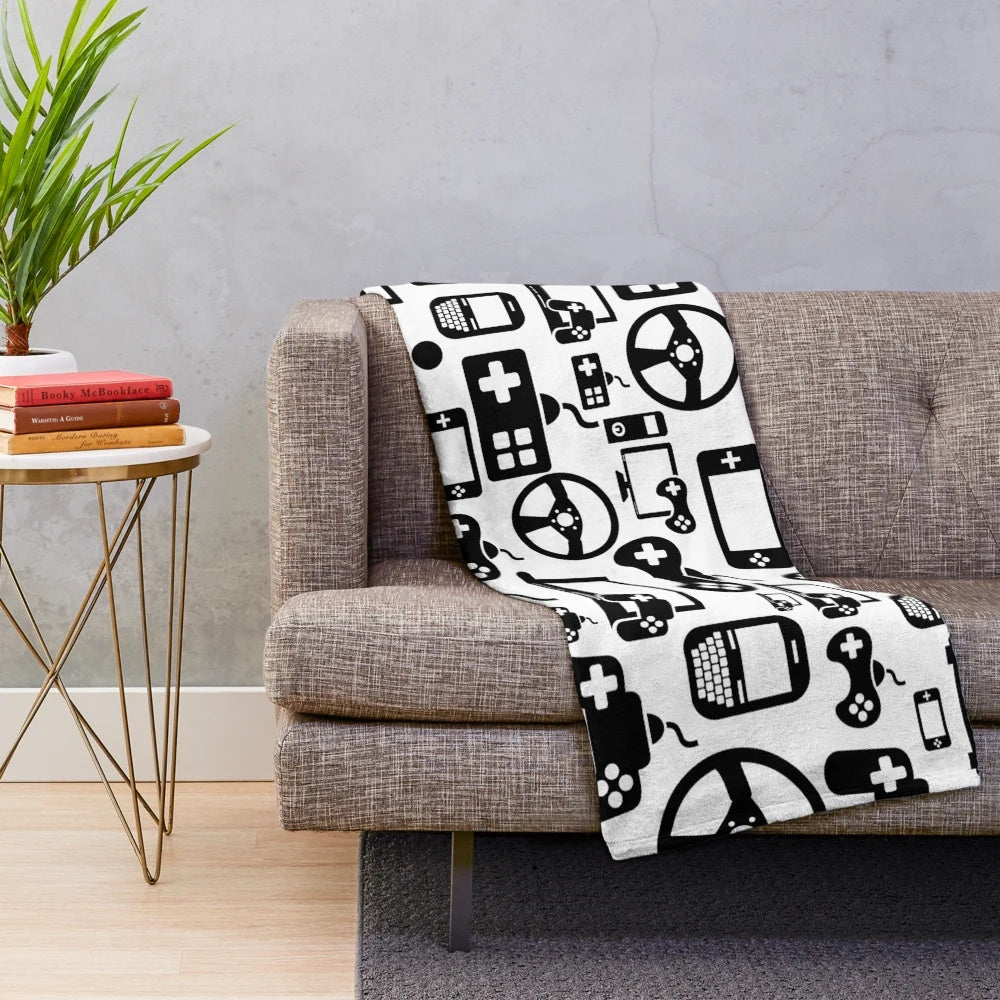 A cozy plush blanket with a gaming-inspired design, perfect for gamers.