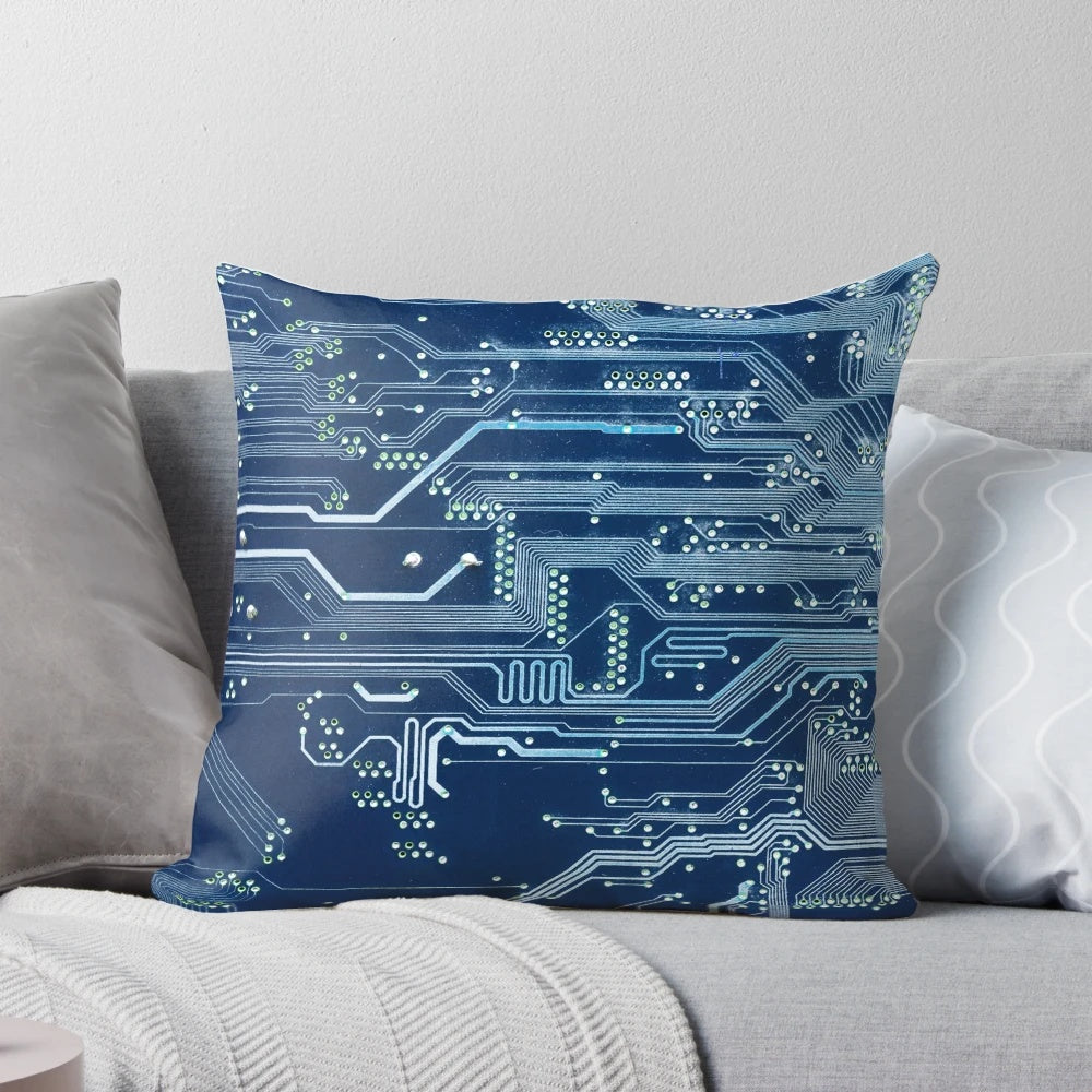 A soft, comfortable pillow adorned with the intricate details of an electronic circuit board design.