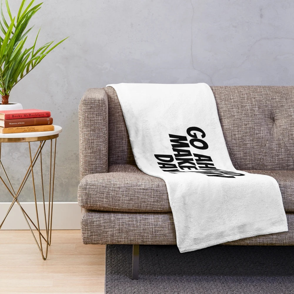 Plush blanket with "Go Ahead, Make My Day" movie quote and vintage-style typography