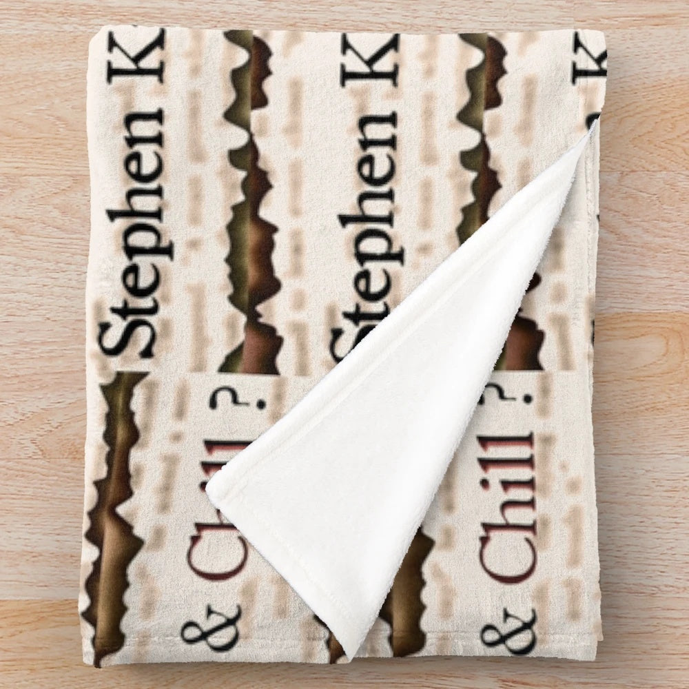 Plush blanket featuring a Stephen King-themed design
