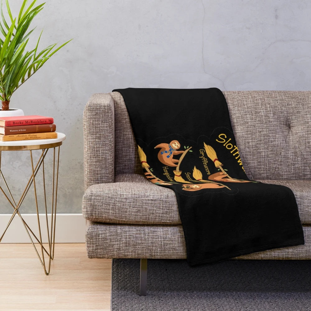 Magical sloth plush blanket with sleepy sloths and wizard accessories