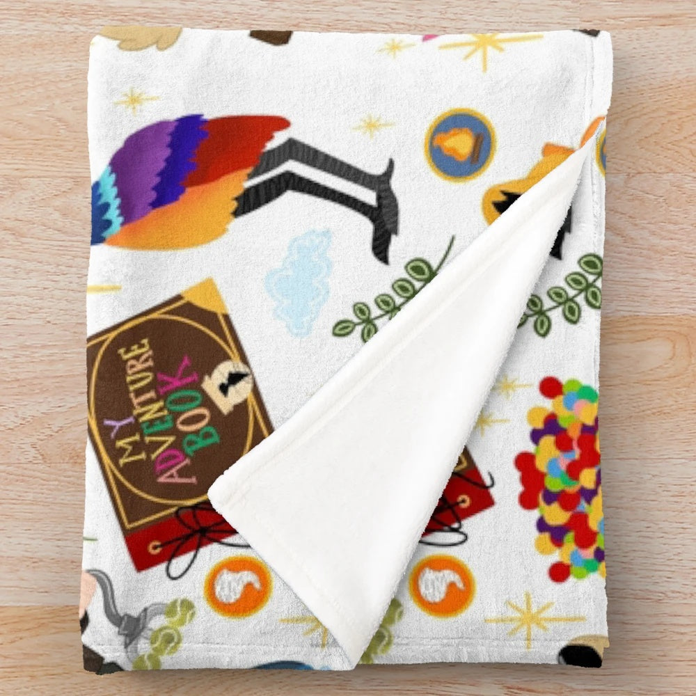 Plush blanket featuring characters and imagery from the Disney Pixar film "Up