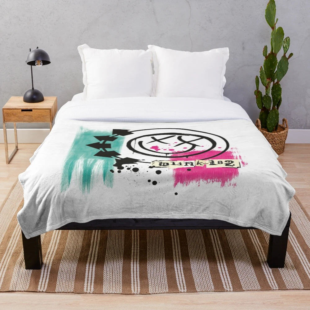 Blink-182 plush blanket with band's iconic logo and name