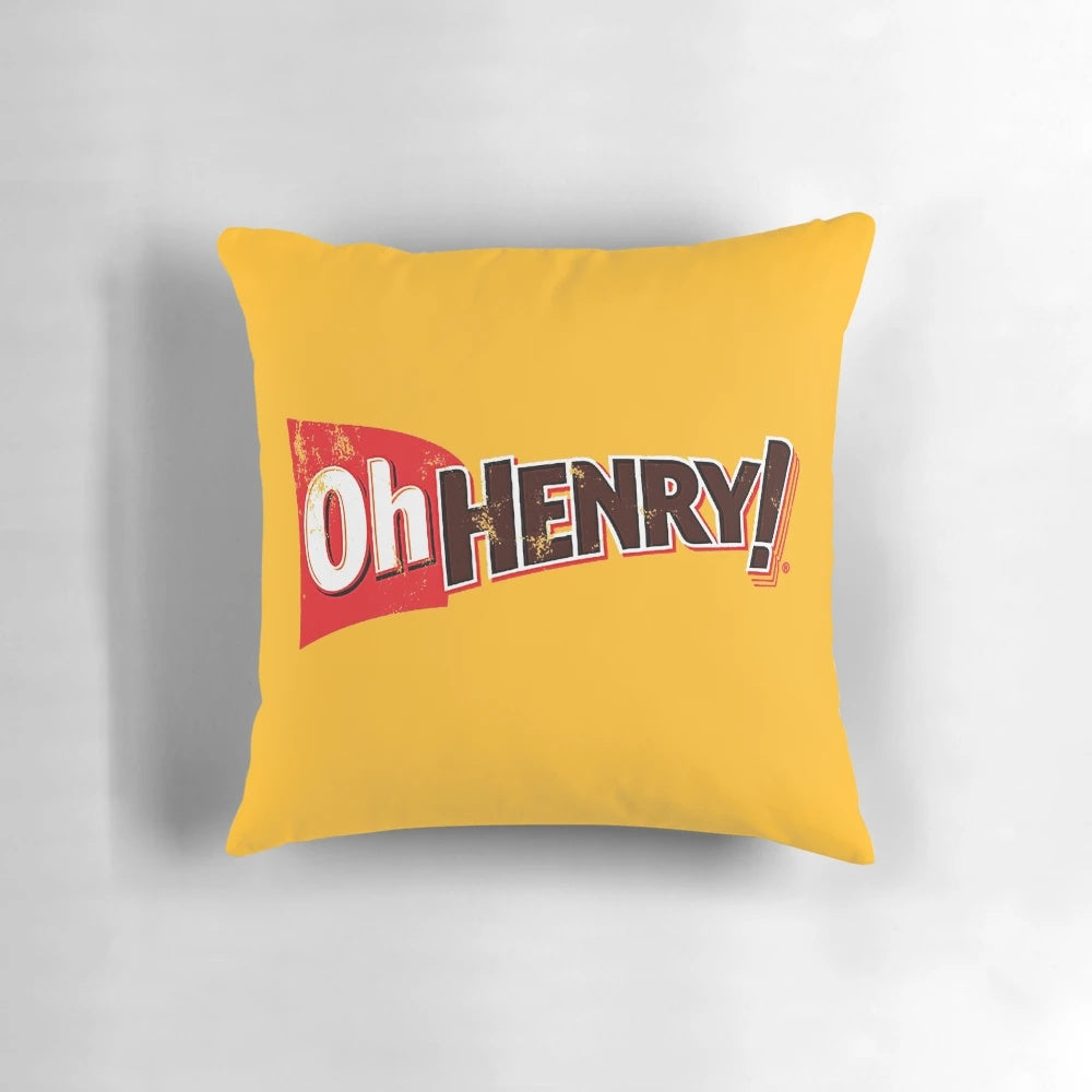 A plush pillow featuring the iconic Oh Henry candy bar design, perfect for nostalgic decor and snuggling.
