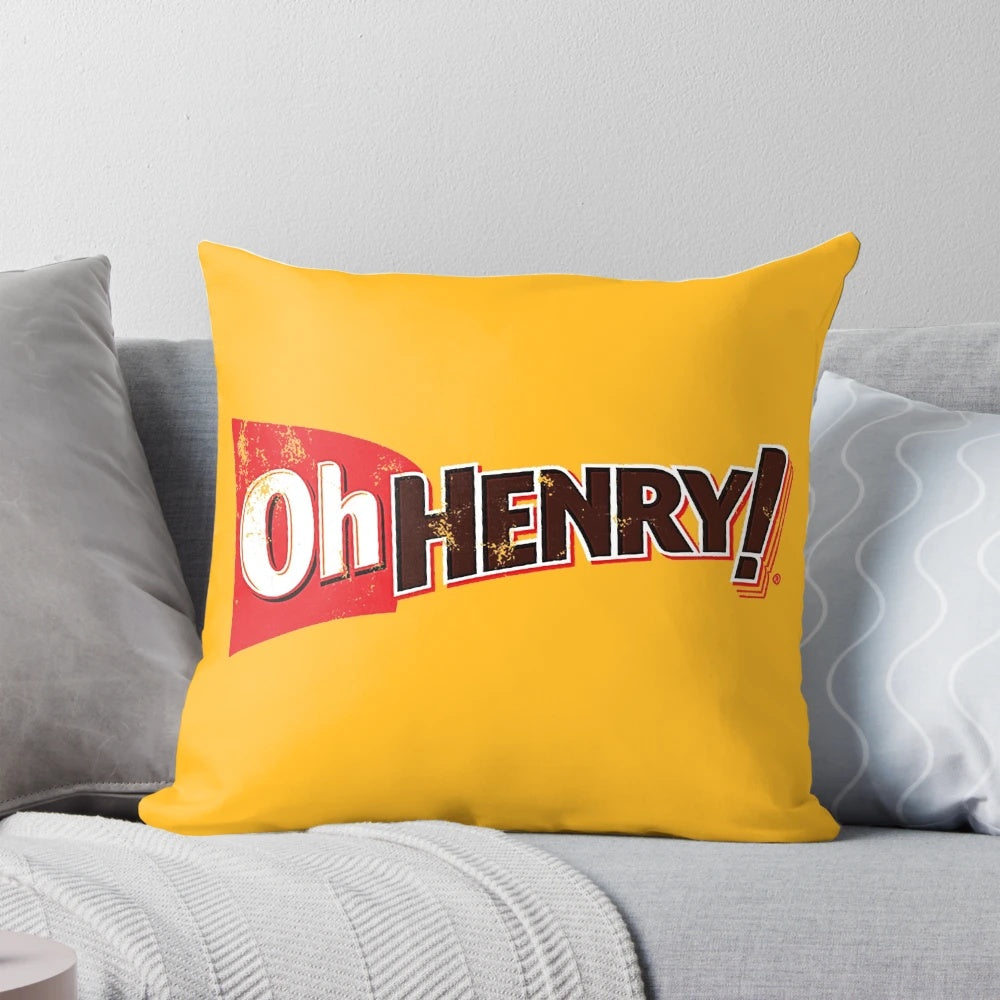 A plush pillow featuring the iconic Oh Henry candy bar design, perfect for nostalgic decor and snuggling.