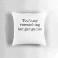 Hunger Games themed throw pillow featuring Katniss Everdeen and Peeta Mellark