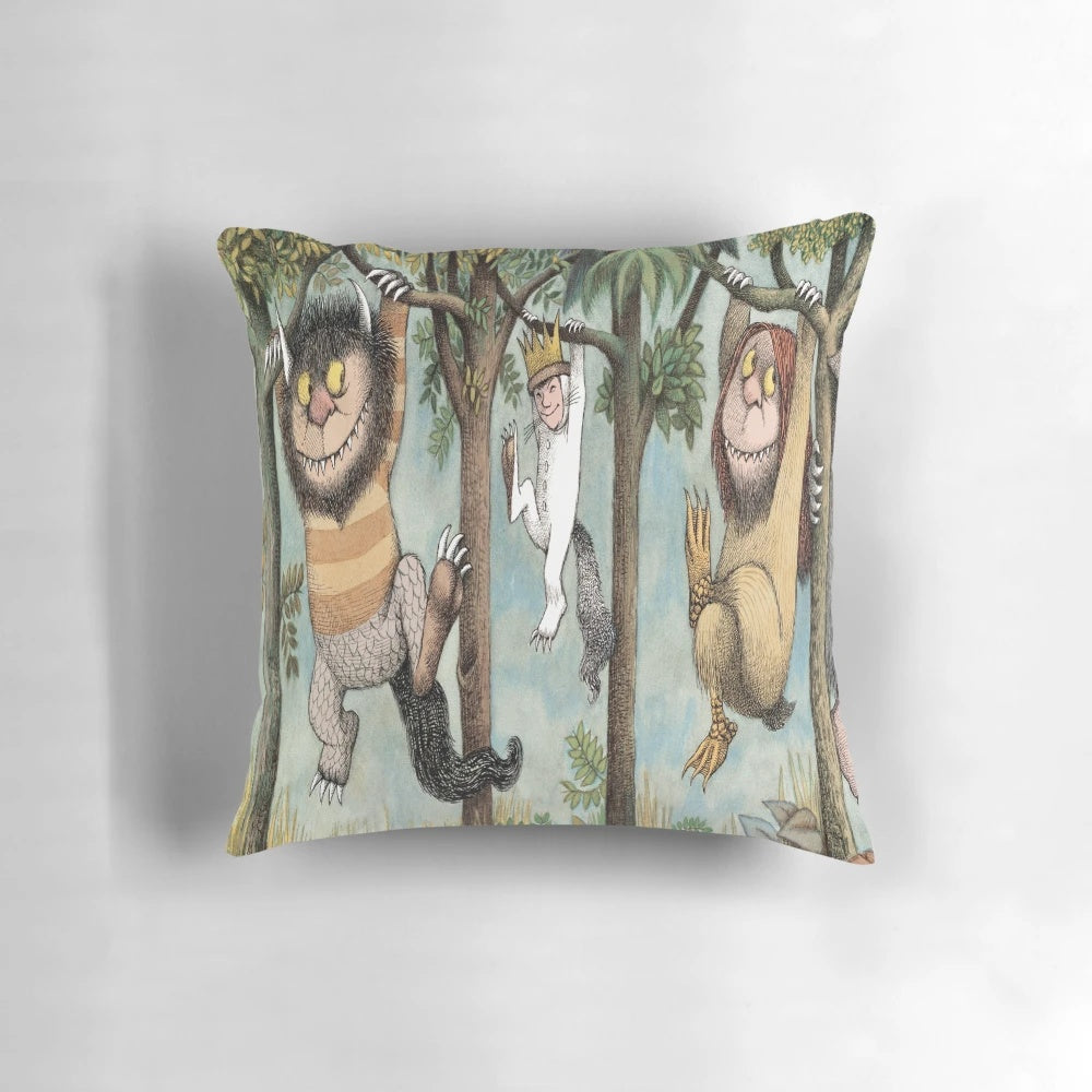 A plush, decorative pillow featuring the beloved characters from the classic children's book "Where the Wild Things Are"