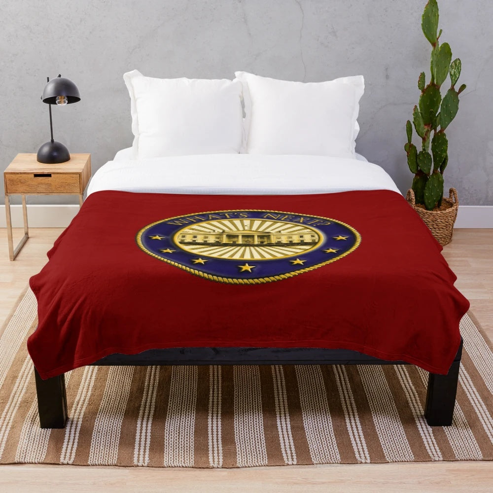 Plush blanket featuring the West Wing podcast logo