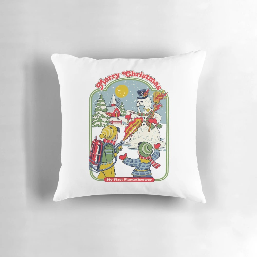 A vintage-inspired pillow design featuring a comical flamethrower snowman