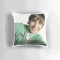 A plush pillow featuring a selfie of actor Zac Efron, known for his role as Troy Bolton in High School Musical.