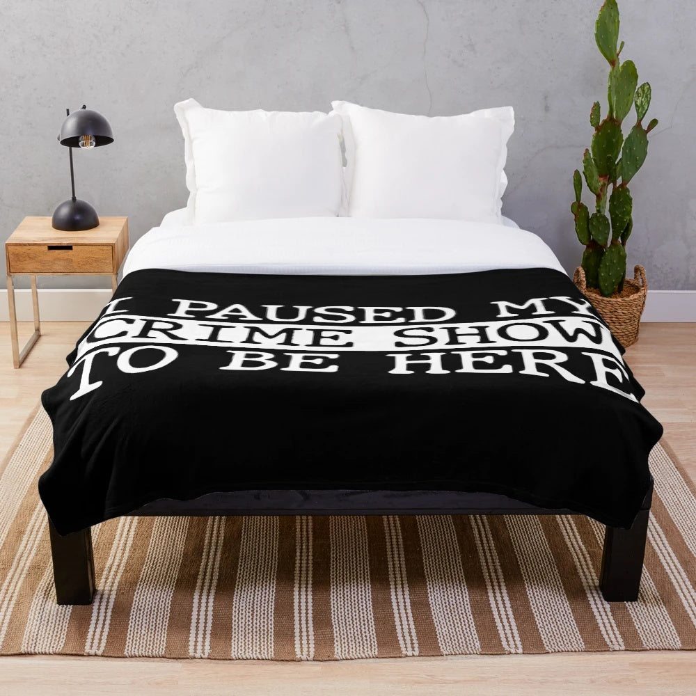 Plush "I Paused My Crime Show" Blanket featuring crime show references