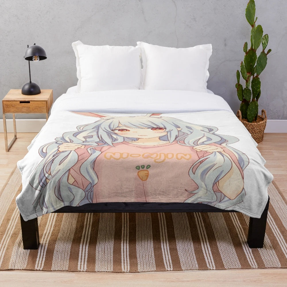Soft and cuddly plush blanket featuring the beloved VTuber, Usada Pekora