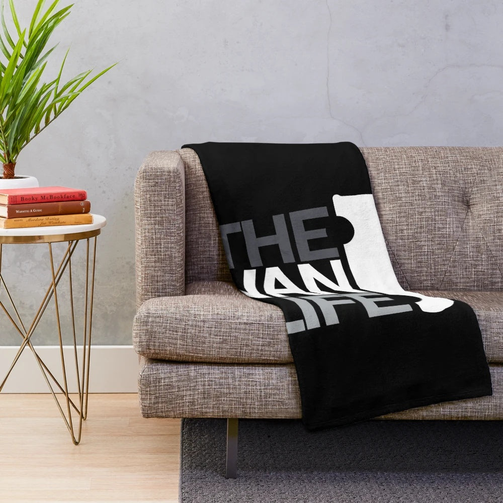 Plush blanket with van life inspired greyscale design