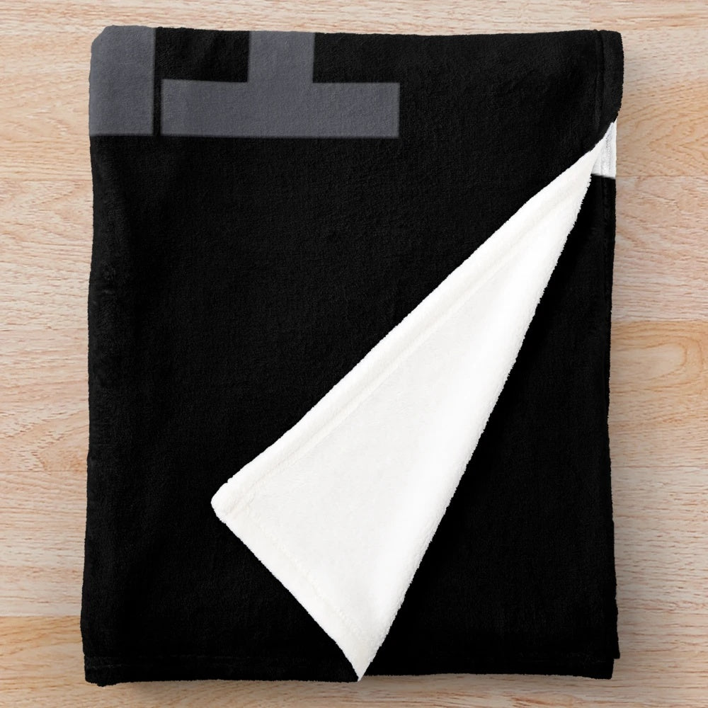 Plush blanket with van life inspired greyscale design