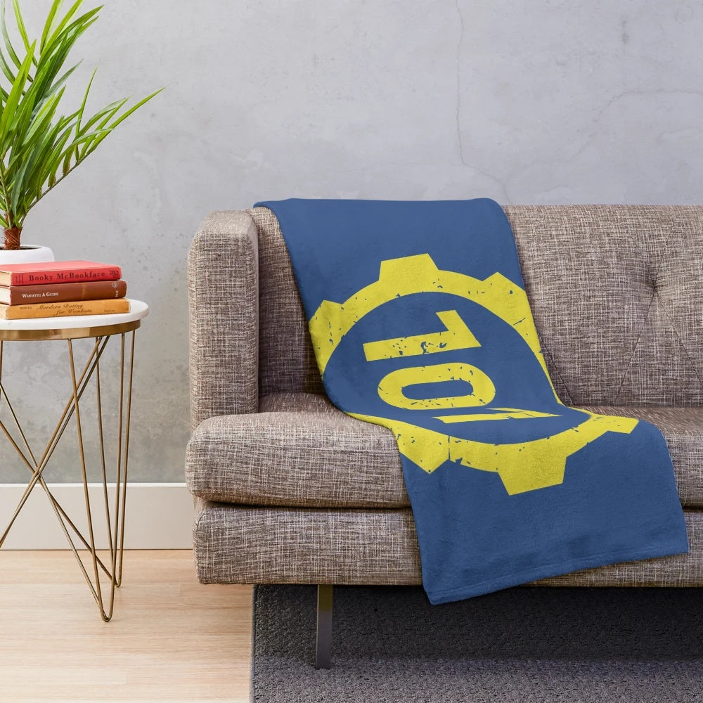 Soft and plush vault 101 themed blanket with vault boy logo