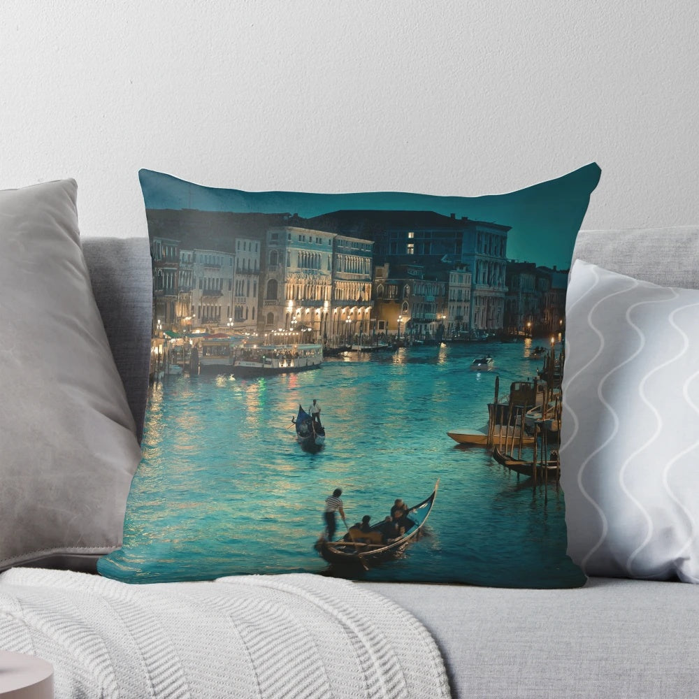 A soft, plush travel pillow featuring a scenic view of the historic canals and architecture of Venice, Italy.