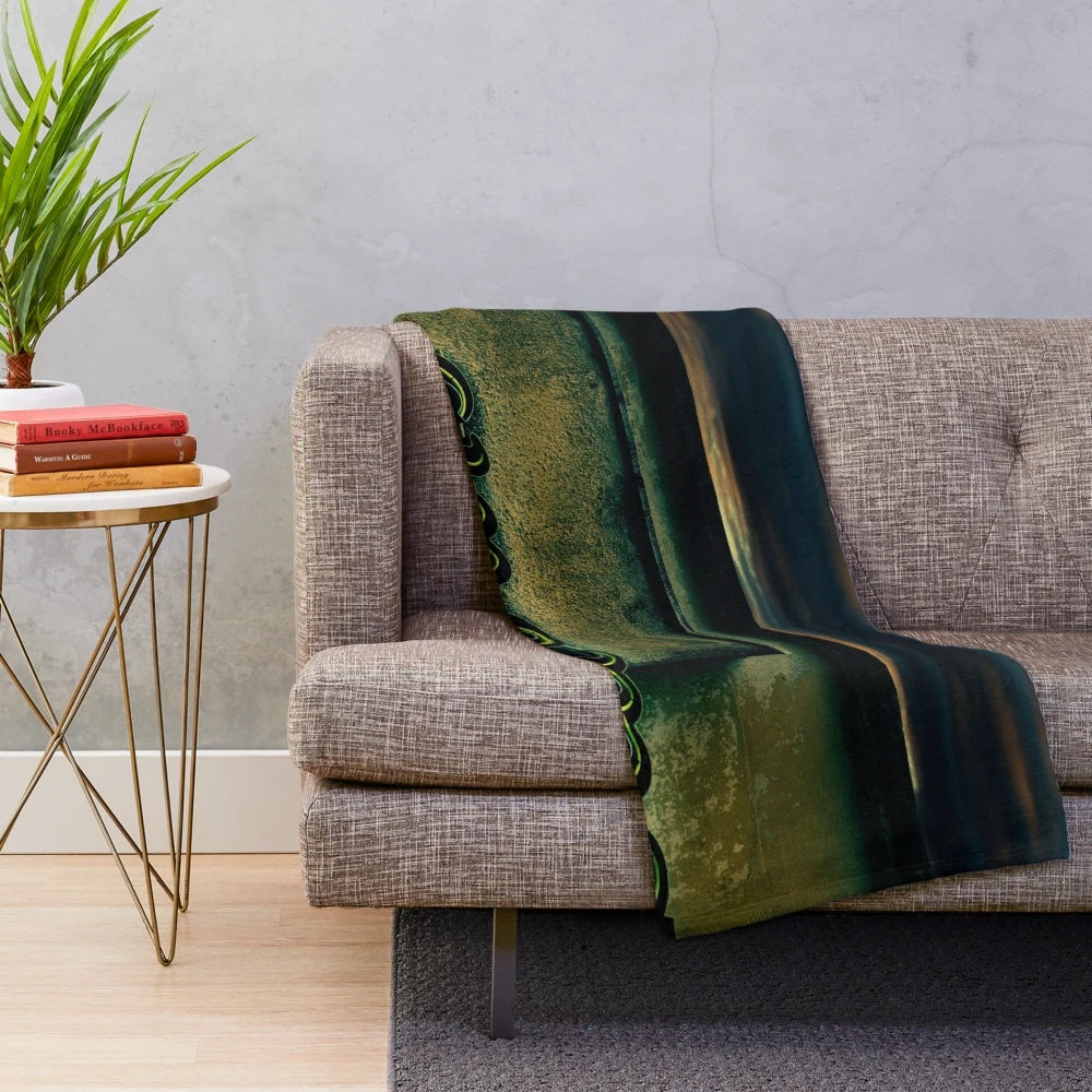Vintage cinema-themed plush blanket with architectural and neon elements