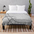 Plush blanket with a vintage cinema wall design