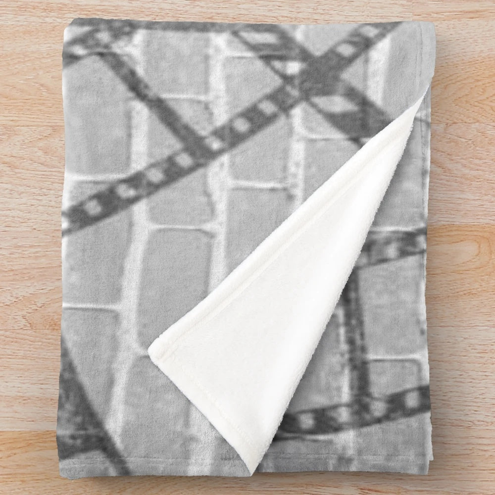 Plush blanket with a vintage cinema wall design