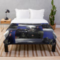 Plush blanket with an old-fashioned movie projector design