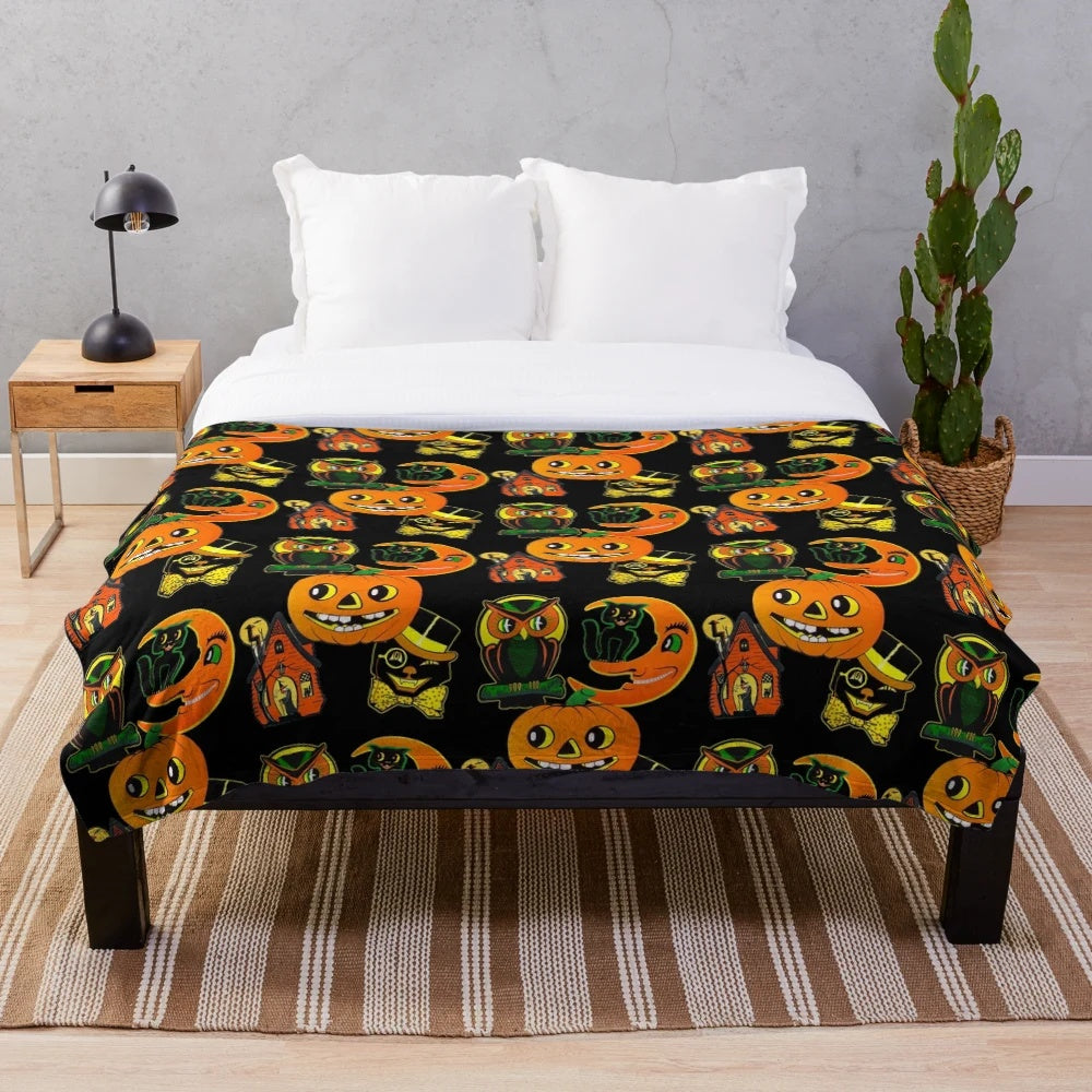 Vintage-inspired Halloween plush blanket with retro Beistle designs