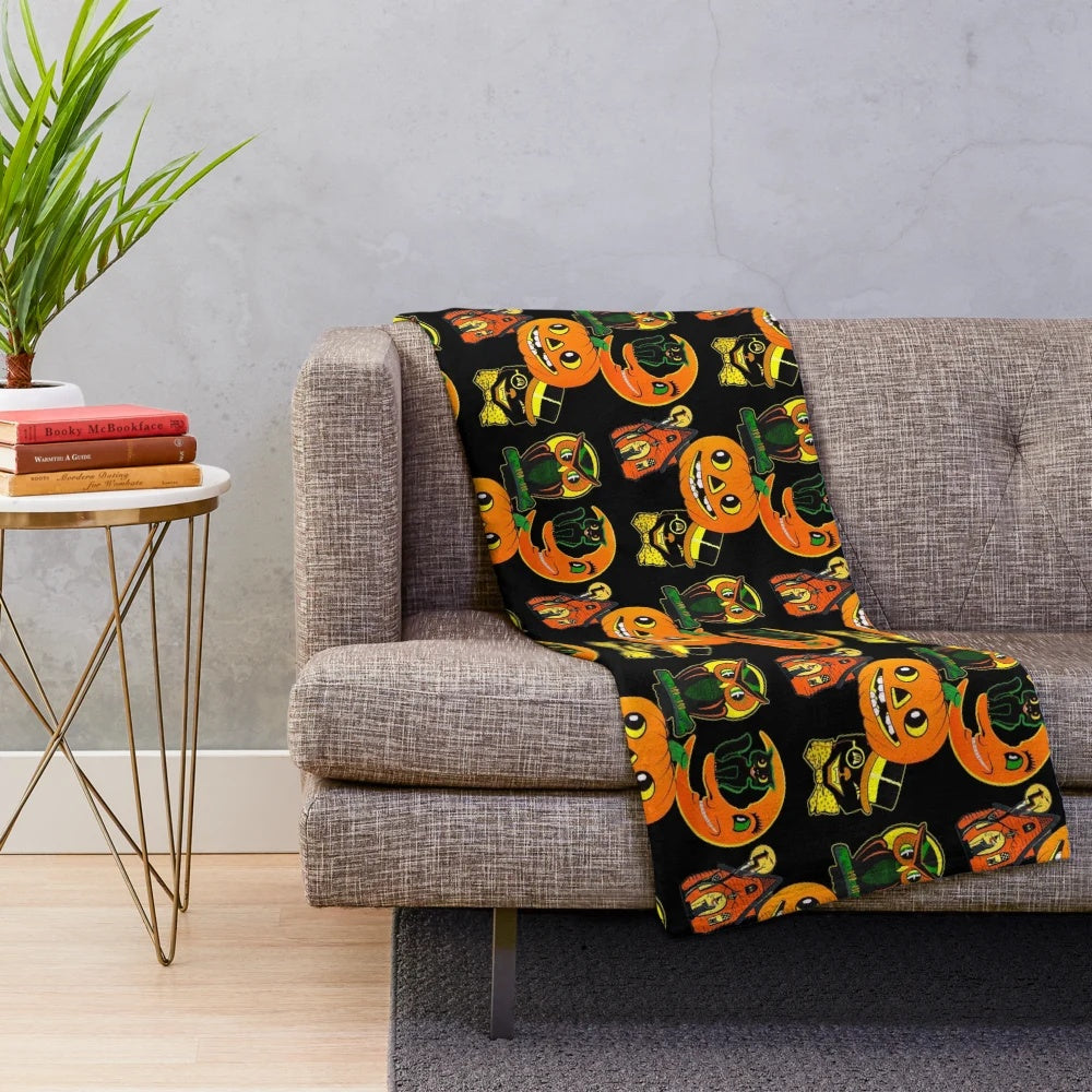 Vintage-inspired Halloween plush blanket with retro Beistle designs