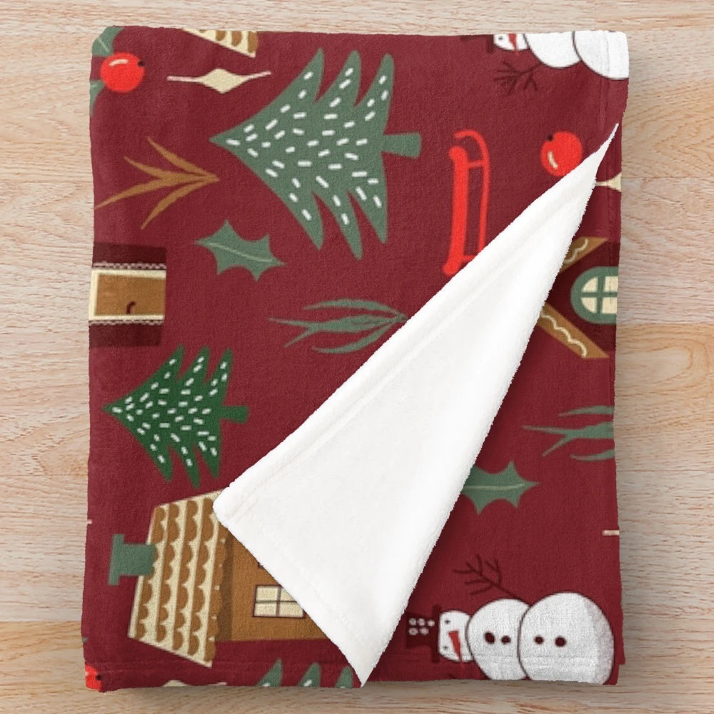 Vintage-style Christmas plush blanket with winter and holiday motifs