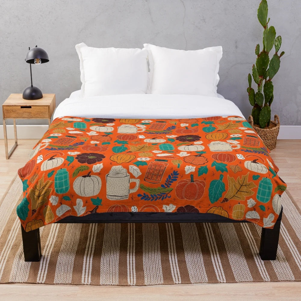 Vintage autumn-themed plush blanket with warm tones and seasonal leaf pattern