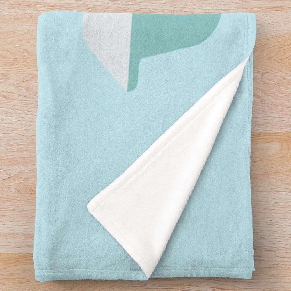 Soft and vibrant plush blanket featuring a retro Pyrex-inspired floral and starburst pattern
